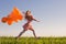 Girl with orange balloons outdoor