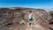 Girl overlooking Death Valley at Father Crowley Overlook, Nevada, United States