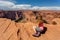 Girl overlooking Horse Shoe Bend landscape, Arizona, United States
