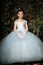 Girl in a pale blue ball gown