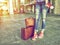 The girl with a passport in hands and plane ticket odizhaet flight for travel with retro luggage. The concept of tourism, holiday