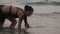 Girl Performers dance acrobatic stunts in the water