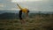 Girl performing yoga exercise. Yoga woman doing bridge yoga pose in mountains