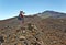 Girl photographing Craters of Pico Viejo in Tenerife Island
