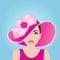 A girl in a pink bonnet