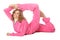 Girl in pink clothes does gymnastic exercise