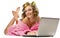 Girl in pink dressing gown lying with laptop