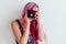 Girl with pink hair photographs camera photo