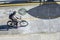 Girl in pink sneakers rides bike enjoying healthy lifestyle