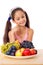 Girl with plate of fruit