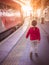 Girl on the platform on the train station