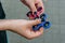 Girl play with fidget spinner stress relieving toy