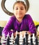 Girl playing chess