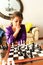 Girl playing chess