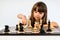 Girl playing chess