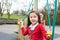 Girl Playing On Climbing Frame In School Playground