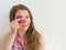 Girl playing with a colourful hand fidget spinner toy