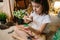 Girl playing observing toy bugs with a magnifying glass