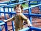 Girl playing in park maze