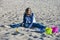 Girl playing in sand