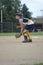 Girl Playing Second Base on Softball Field