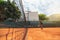 A girl playing tennis on a court