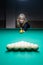 The girl plays billiards