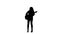 Girl plays the guitar and sings. White background. Silhouette