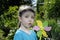 Girl plays with windmill