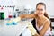 Girl polishing shelves indoors