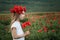 Girl among a poppy field