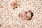 Girl portrait in popcorn. Image of beautiful european woman 20s eating popcorn. Eating popcorn. Young woman buried in