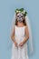 Girl portraying a dead bride with face painting on Halloween