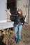 Girl poses near the iron trailer