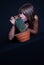 Girl posing in studio with cactus