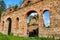 Girl posing in technical ruin. Iron Smelting Plant called Frantiskova Huta in Slovakia