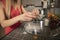 Girl is preparing cake for Christmas, putting eggs