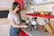 Girl preparing moka pot cofee in the kitchen