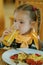 Girl-preschooler drinking orange