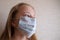 Girl in protective antiviral mask