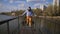 Girl in a protective antiviral mask on a bridge in a Park during a pandemic coronavirus.