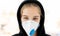 Girl in protective facial mask