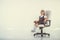 Girl proudly sits on a chair