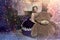 Girl in purple dress at christmas with a huge bear