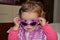 Girl with purple sunglasses
