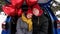 Girl puts her head on the guy's shoulder. Portrait happy couple faces looking at camera. St Valentines Day celebration