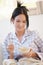 Girl in pyjama having cereal