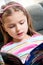 Girl reading English book