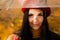 A girl with a red beret and her wet umbrella