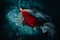 A girl in a red dress is floating on the water.A journey on the water of a single woman